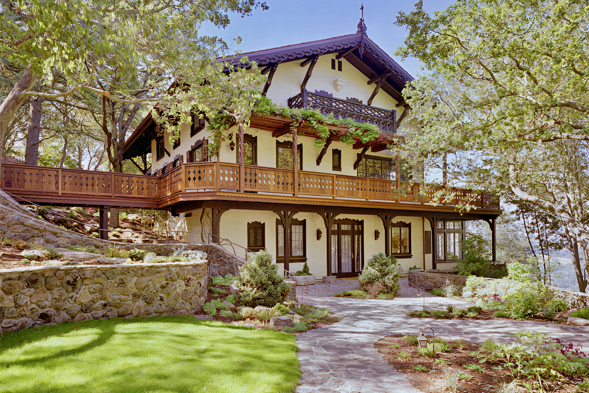 Canyon Design Build transformed this Orinda, CA property into a Swiss Alpine-style retreat with custom woodwork, detailed interiors, and a fully upgraded guest cottage.