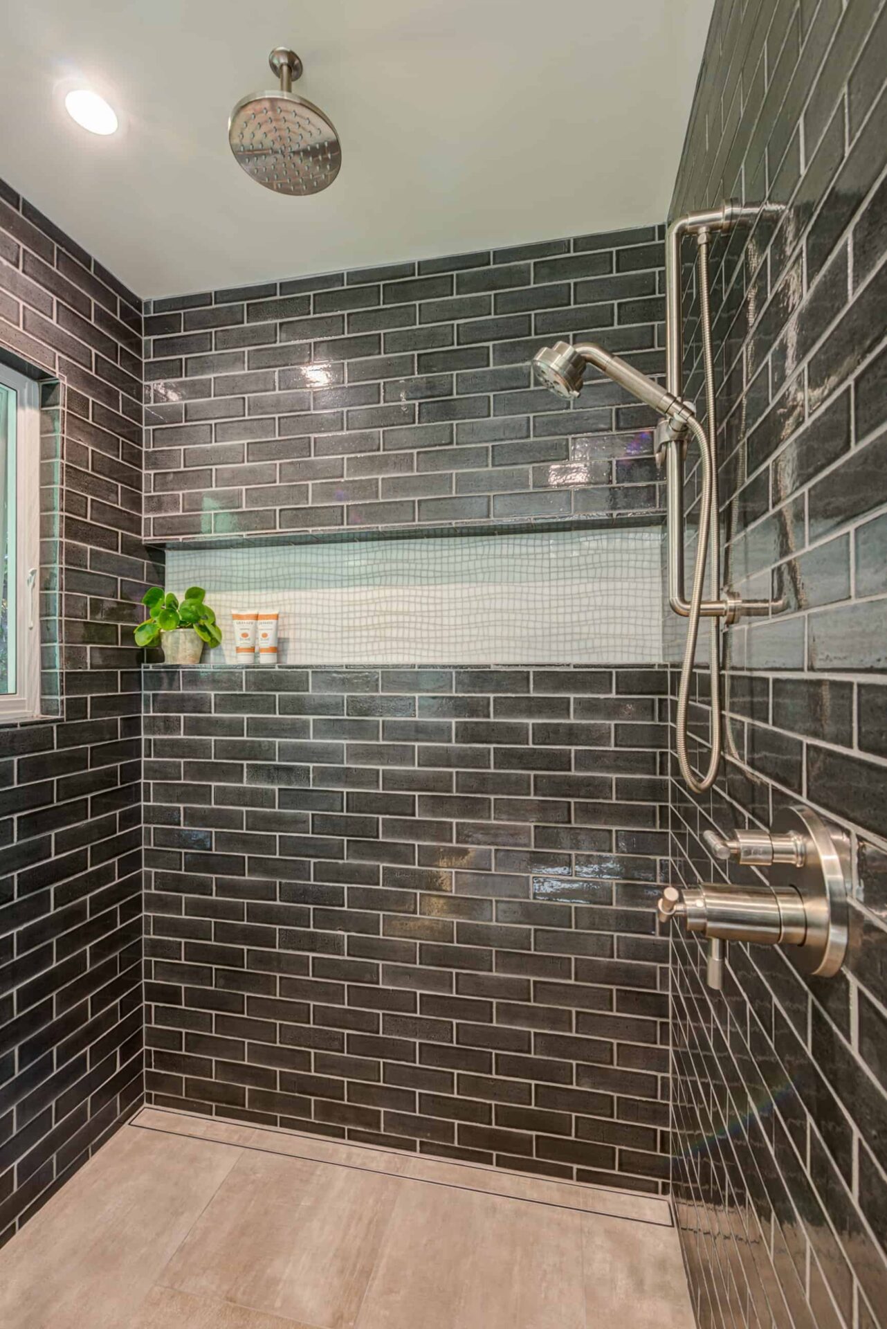 Recent shower renovation with modern subway tiles.