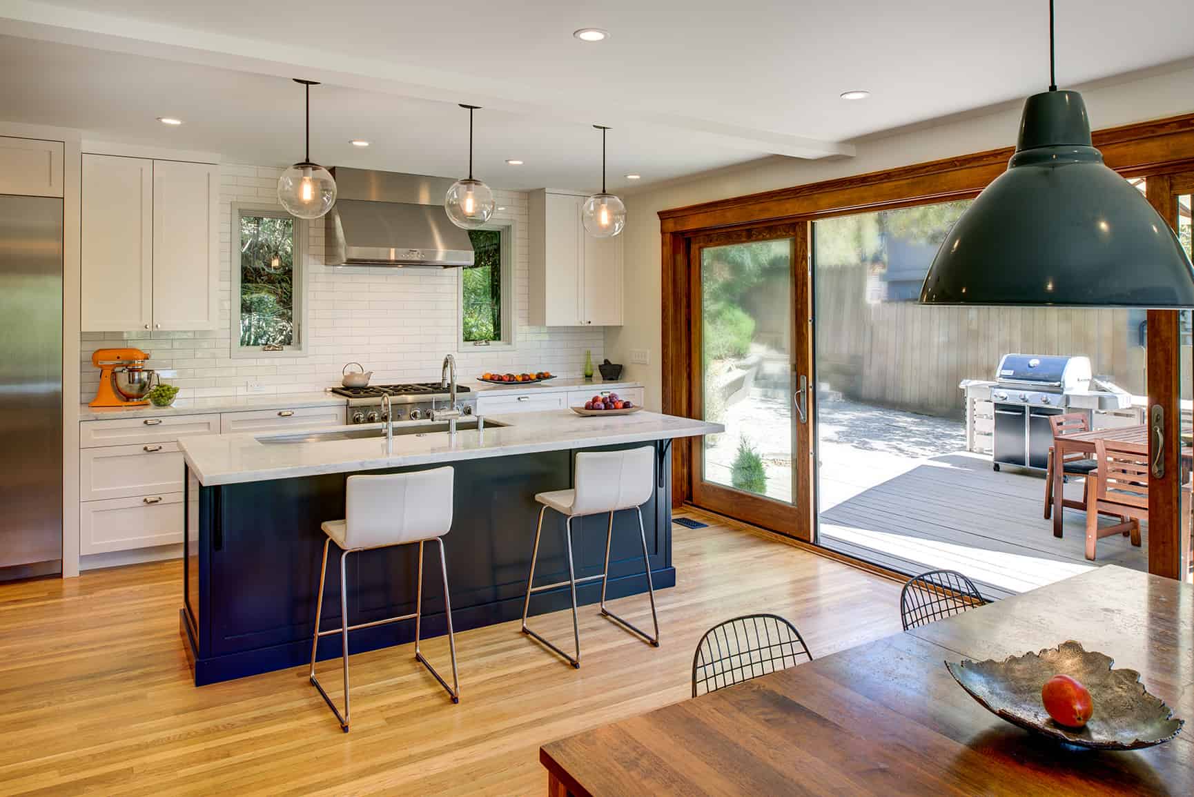 Bright and airy kitchen with views of the exterior.