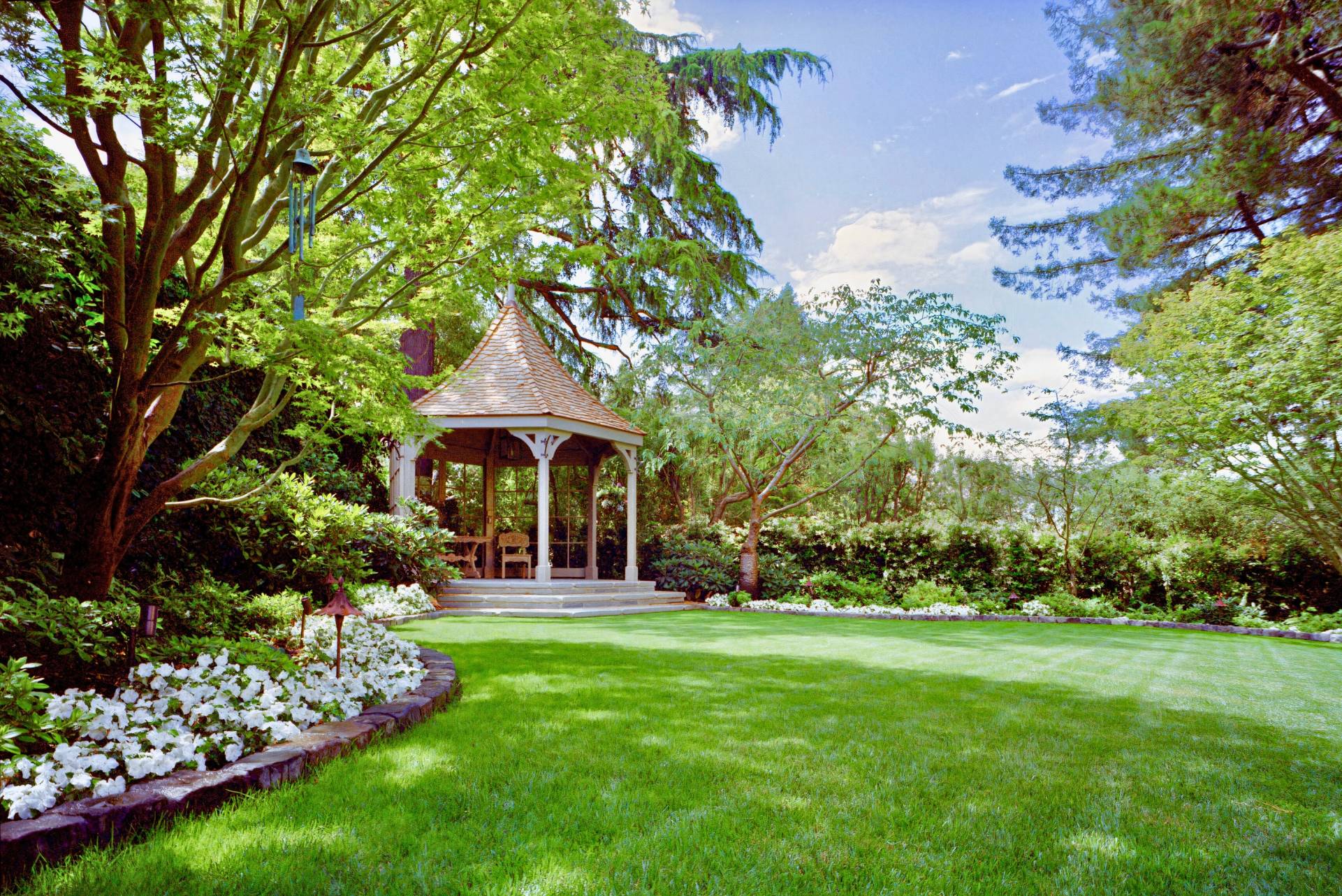 historic storybook-style home originally designed by architect William Yelland, showing restored structural elements and preserved architectural details after a full renovation that blends modern upgrades with the home’s original character.