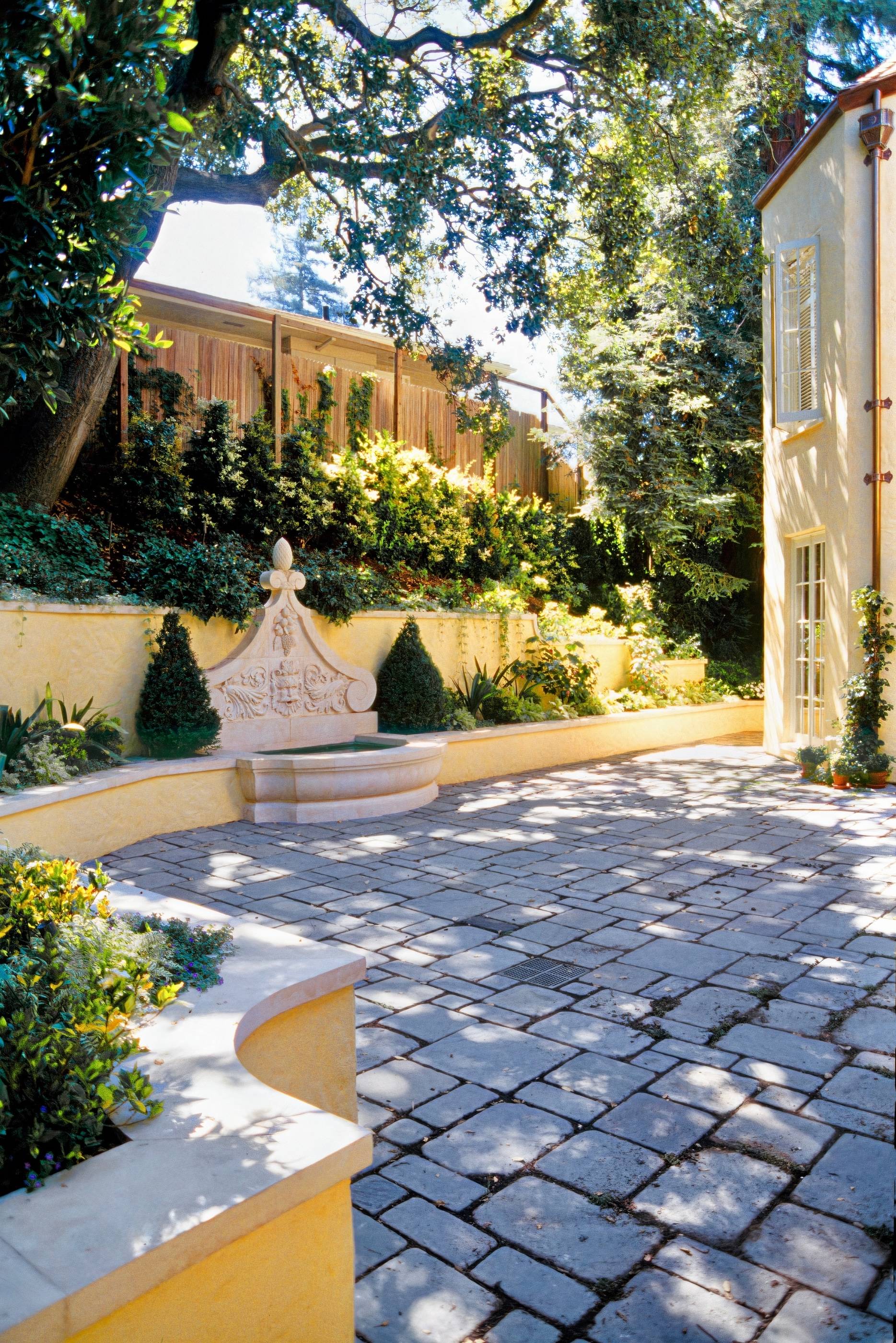 historic storybook-style home originally designed by architect William Yelland, showing restored structural elements and preserved architectural details after a full renovation that blends modern upgrades with the home’s original character.