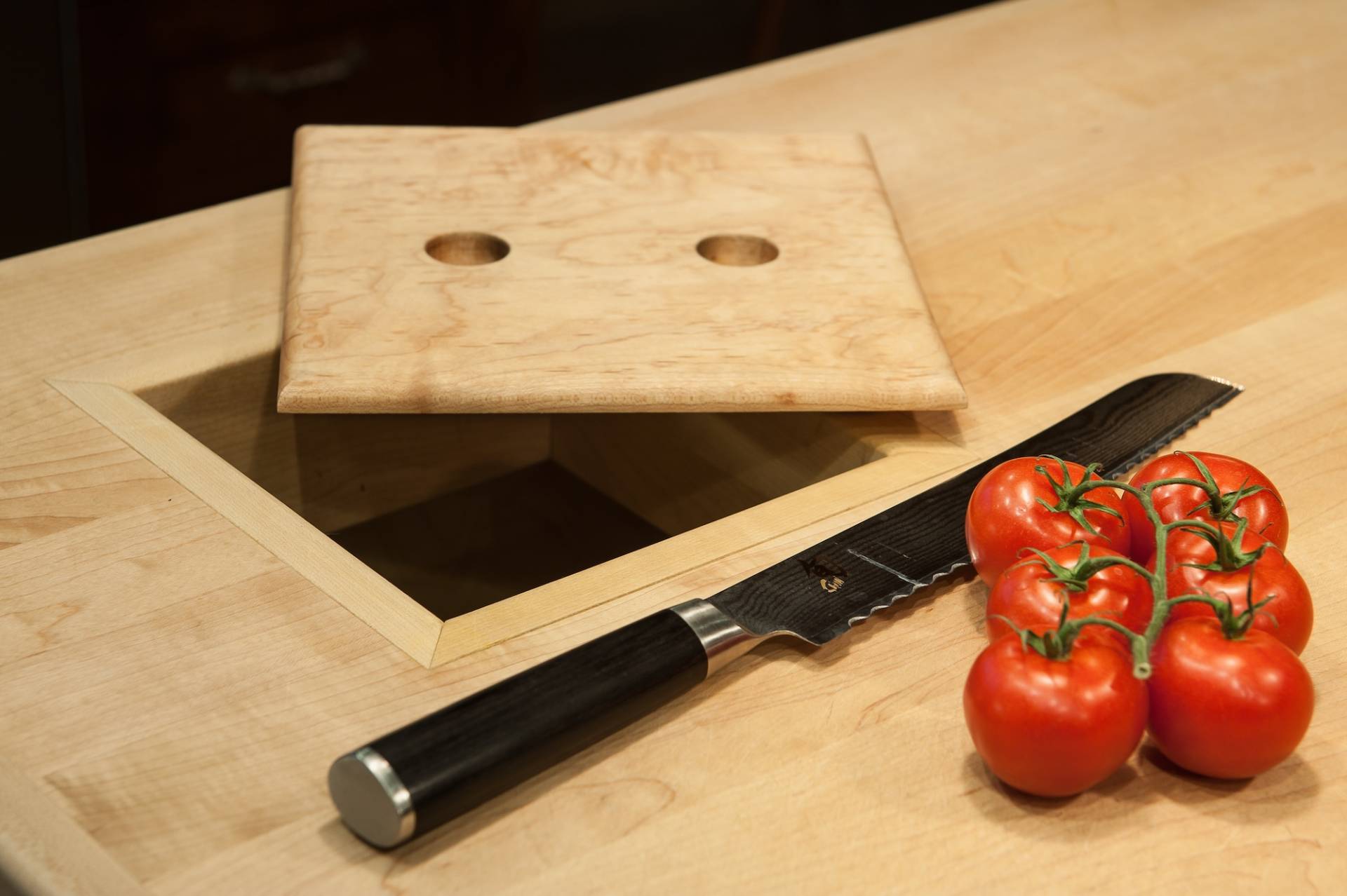 Kitchen island with built in trash by Canyon Design Build in Danville, CA kitchen remodel.
