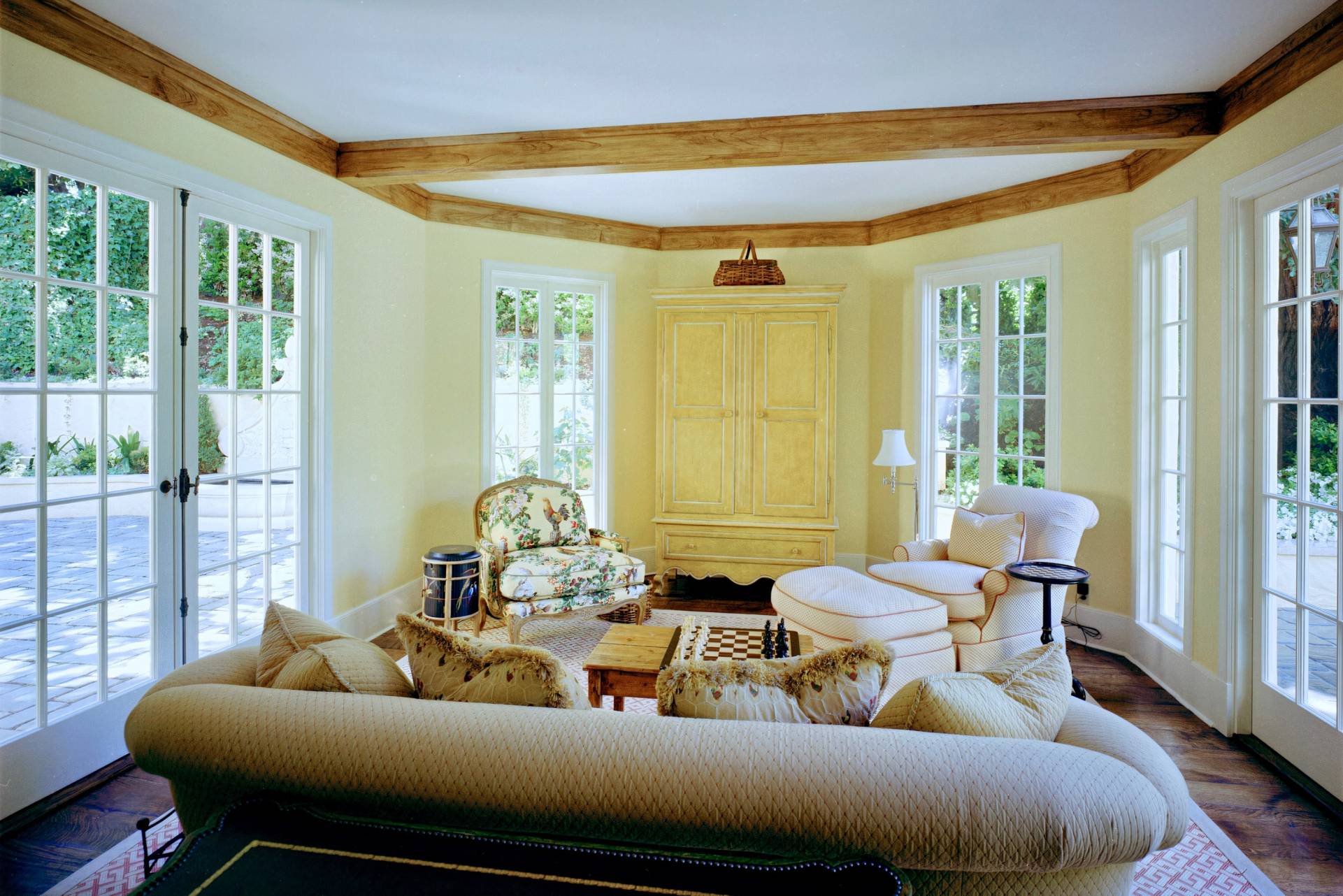 historic storybook-style home originally designed by architect William Yelland, showing restored structural elements and preserved architectural details after a full renovation that blends modern upgrades with the home’s original character.