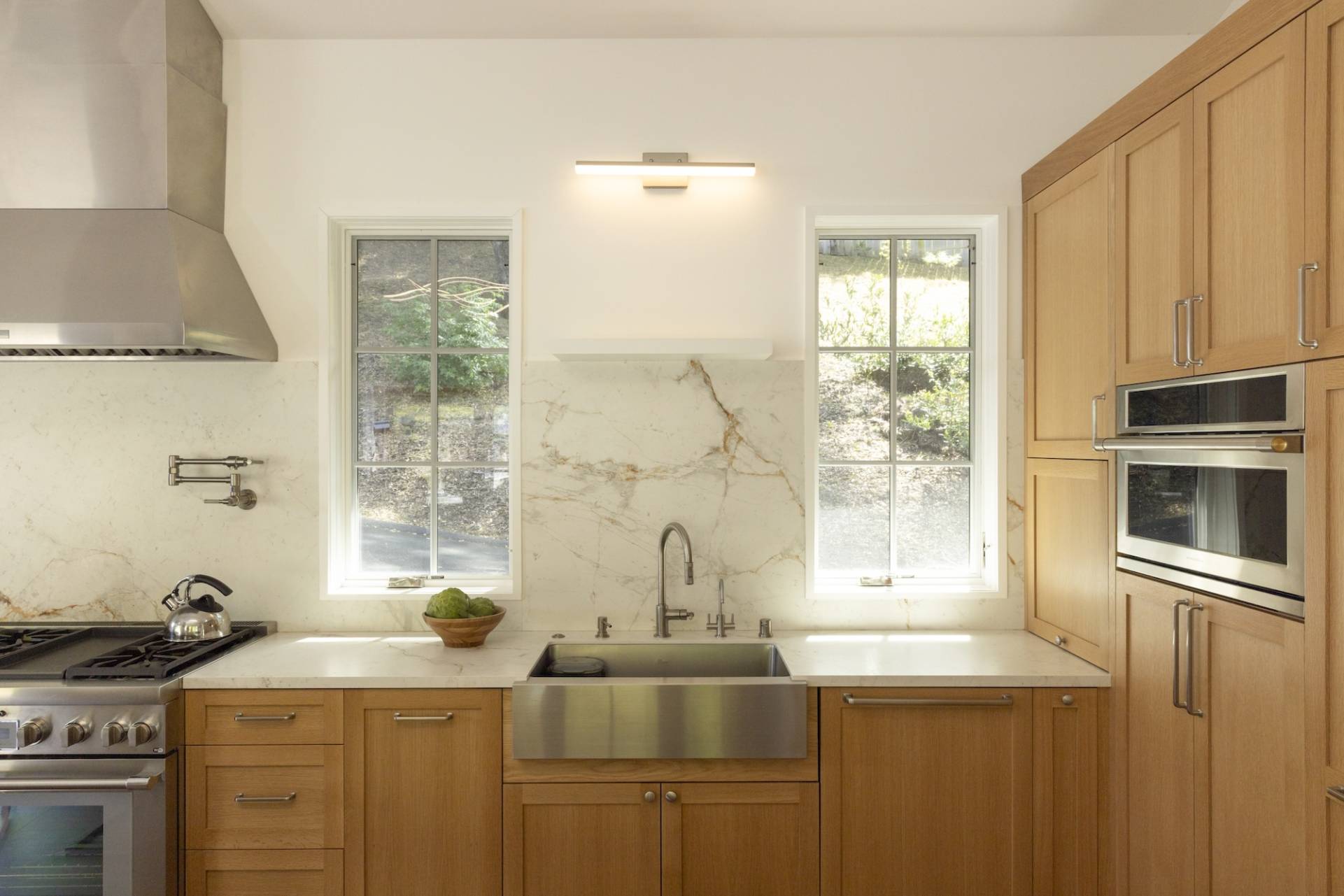 Lafayette, CA Pool House and ADU designed and built by Canyon Design Build. Featuring strong indoor/outdoor connection with master suite, fully equipped kitchen, outdoor shower, and renovated pool area. 