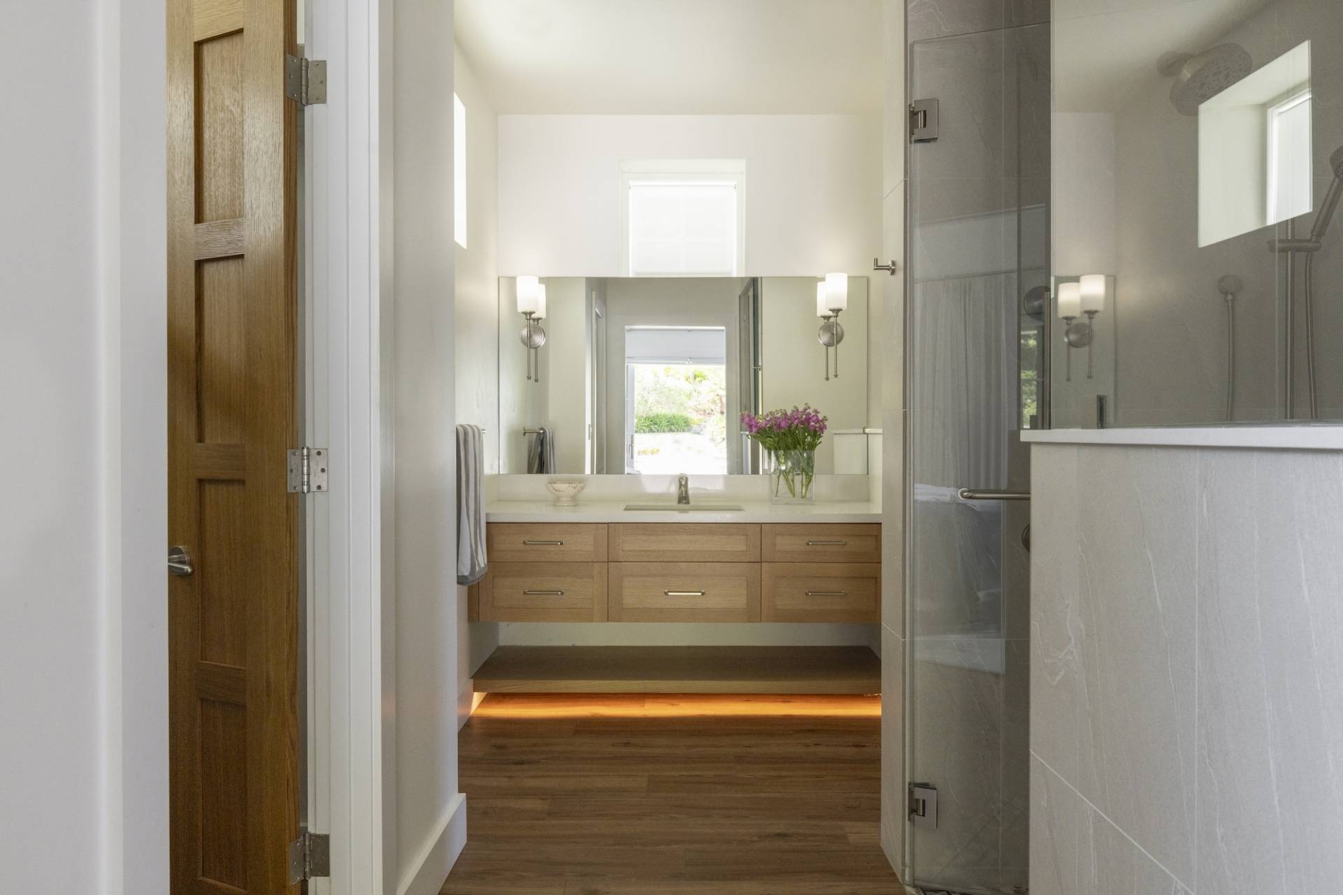 Lafayette, CA Pool House and ADU designed and built by Canyon Design Build. Featuring strong indoor/outdoor connection with master suite, fully equipped kitchen, outdoor shower, and renovated pool area. 